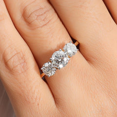 Round Brilliant Diamond Three Stone Engagement Ring in 4K Gold